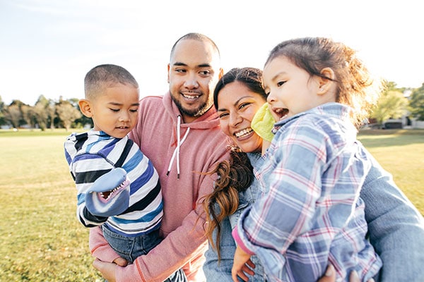 Hispanic \family happy with kids-law attorney services